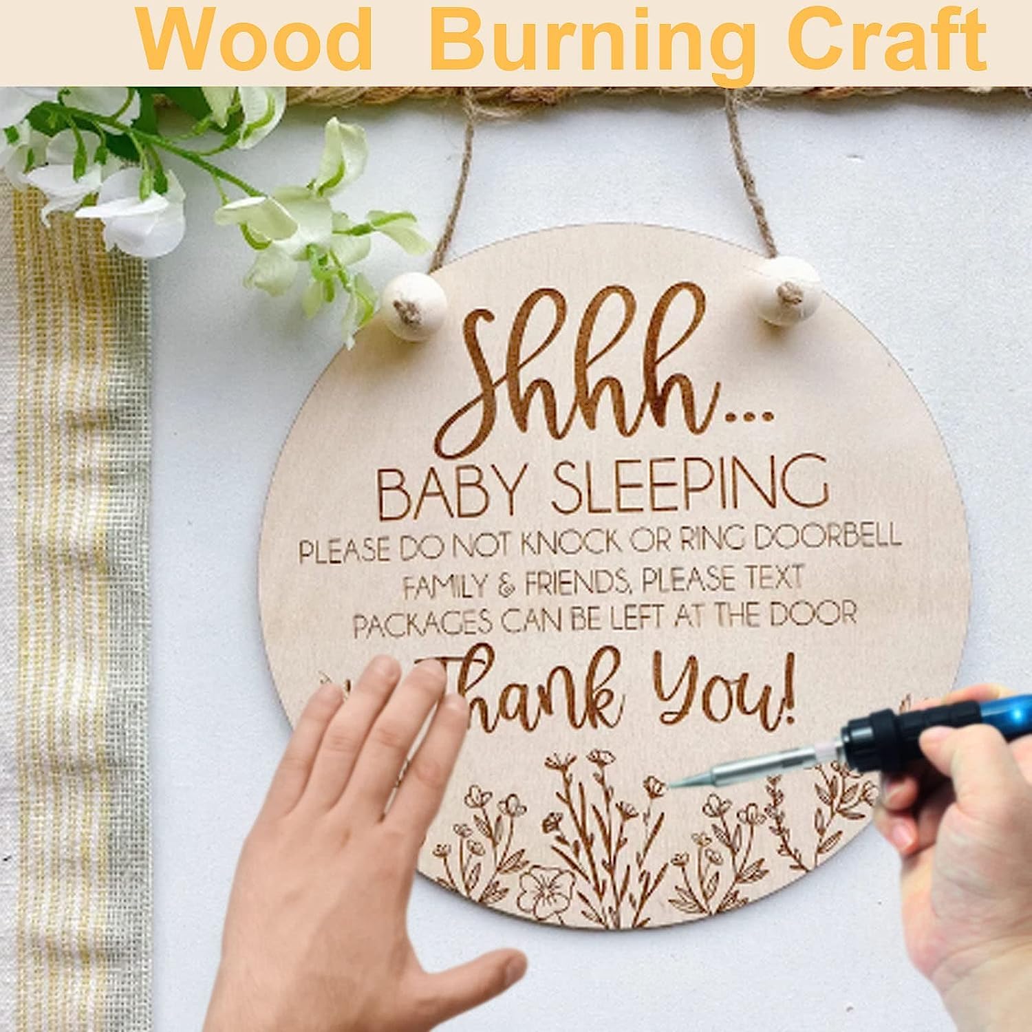 Wooden sign with text 'Shhh.