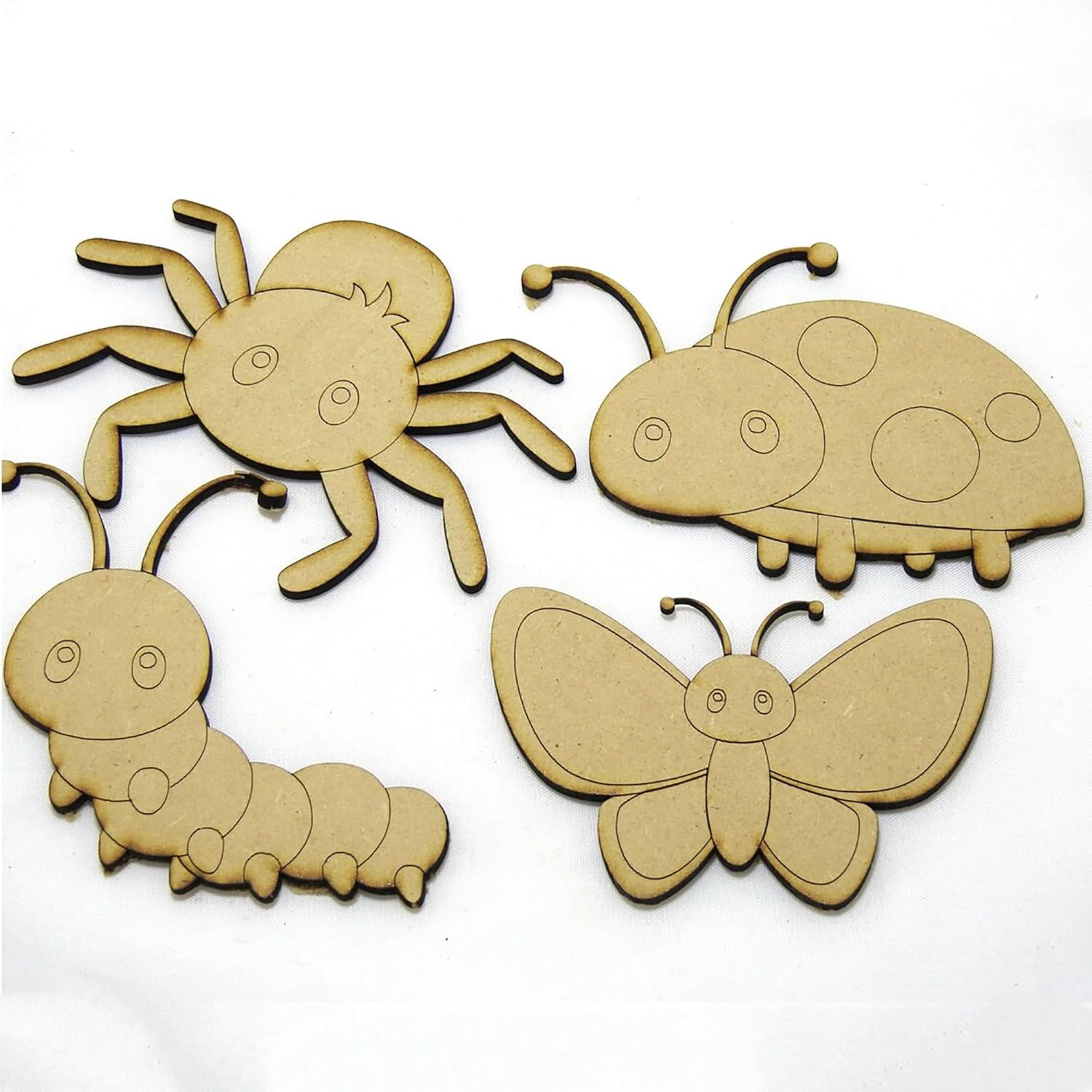 Four wooden insect shapes on a white background