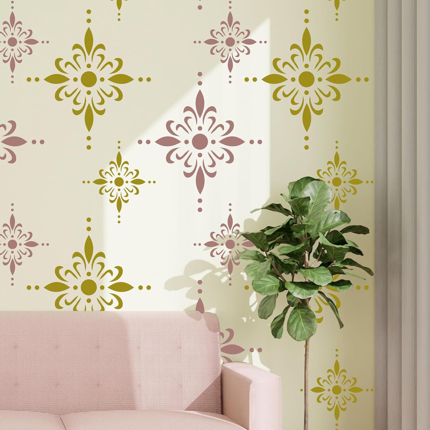 Decorative wall stickers on a wall with a pink sofa and plant.