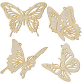 Four beige butterfly-shaped cutout decorations on a white background