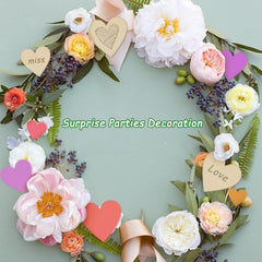 Floral wreath with hearts and text on a light green background