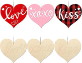 Set of heart-shaped signs with 'love', 'XOXO', and 'kiss' text in various colors and patterns.