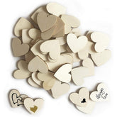 Collection of wooden hearts with various engravings on a white background