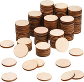 Stacks of round wooden discs on a white background