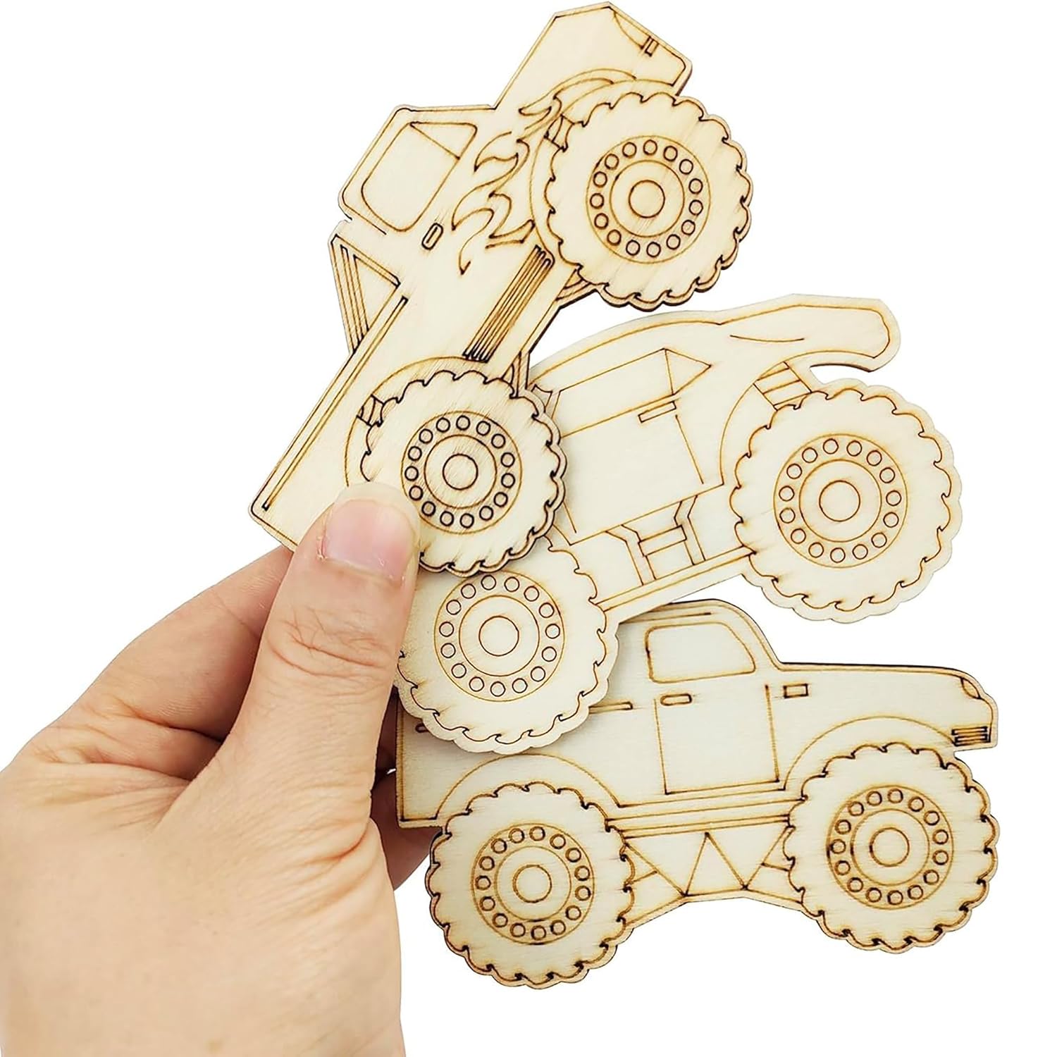 Wooden 3D puzzle of a truck held by a hand on a white background