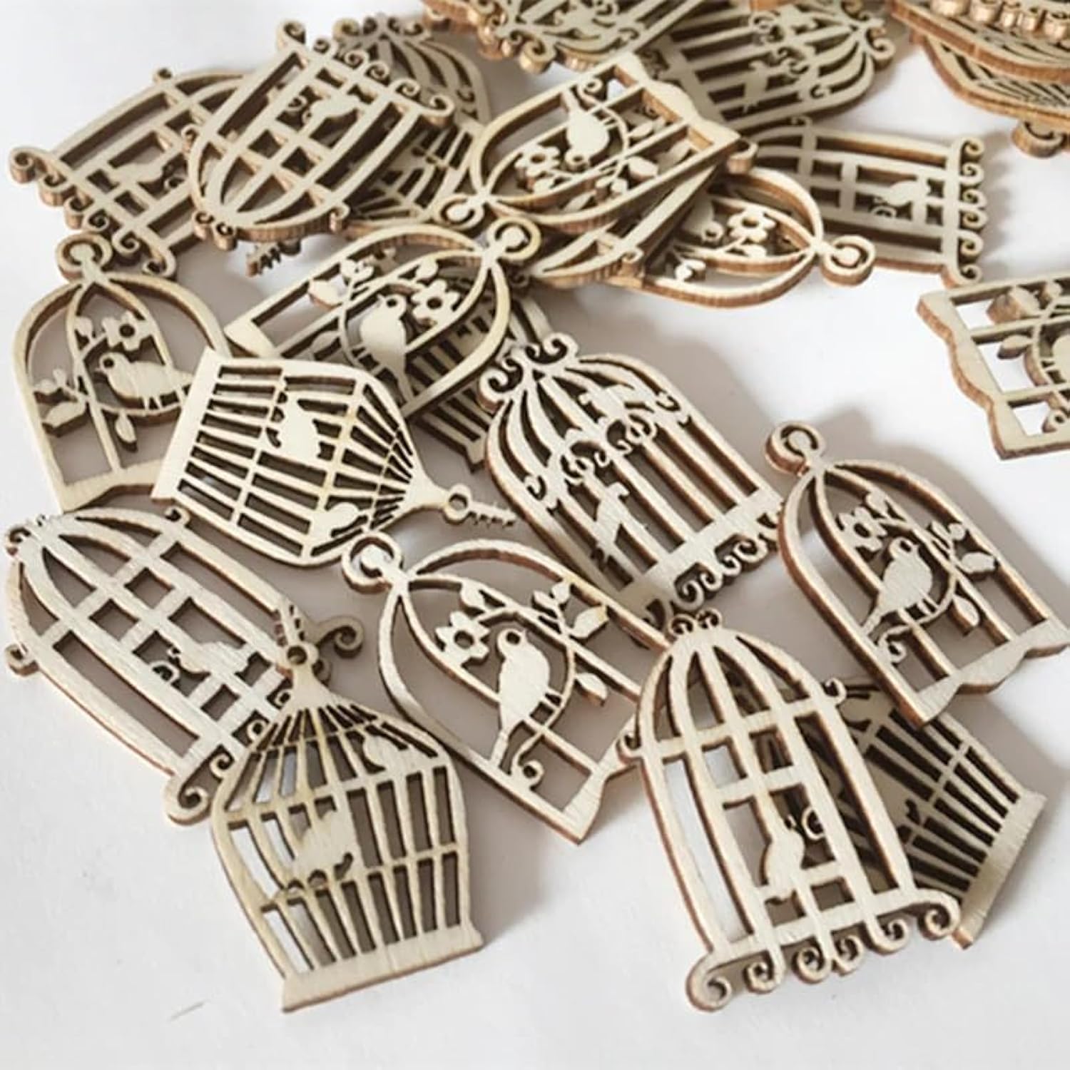 Wooden birdcage ornaments on a white background