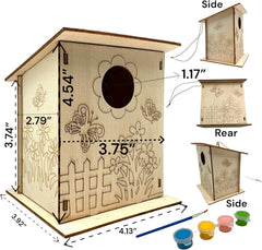 Wooden birdhouse with laser-cut designs and measurement details, accompanied by paint cans and a paintbrush.