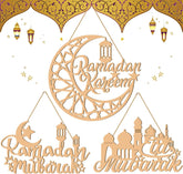 Decorative wooden cutout with 'Ramadan Kareem' and 'Ramadan Mubarak' text on a white background.