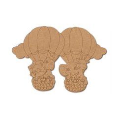 Cardboard cutout of a hot air balloon with a teddy bear inside on a white background