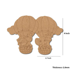 Two cardboard cutouts of elephants with hot air balloons on a white background, showing measurements.