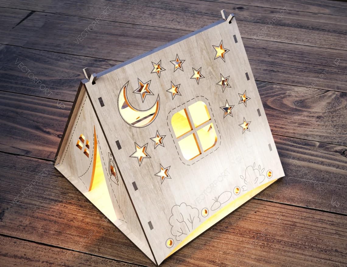 Wooden night light with moon, star, and window design on a wooden surface