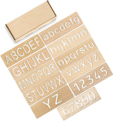 Set of wooden letter and number stamps on a white background