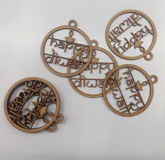 Decorative wooden pieces with 'Happy Diwali' text on a white background