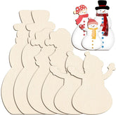 Unfinished wooden snowman shapes with a completed snowman decoration on a white background