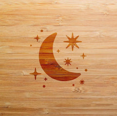 Wooden surface with engraved moon and star designs