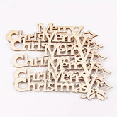 Wooden 'Merry Christmas' decorations on a white background