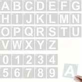 Alphabet and number stencils on a white background