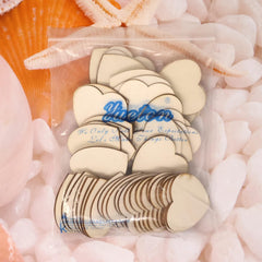 Packaged wooden coasters with a brand logo on a shell and coral background