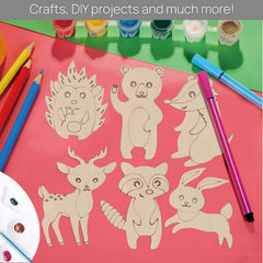 Cardboard animal cutouts with drawing tools on a pink and green background