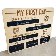 Wooden plaque with chalkboard sections for a child's first day of school details.