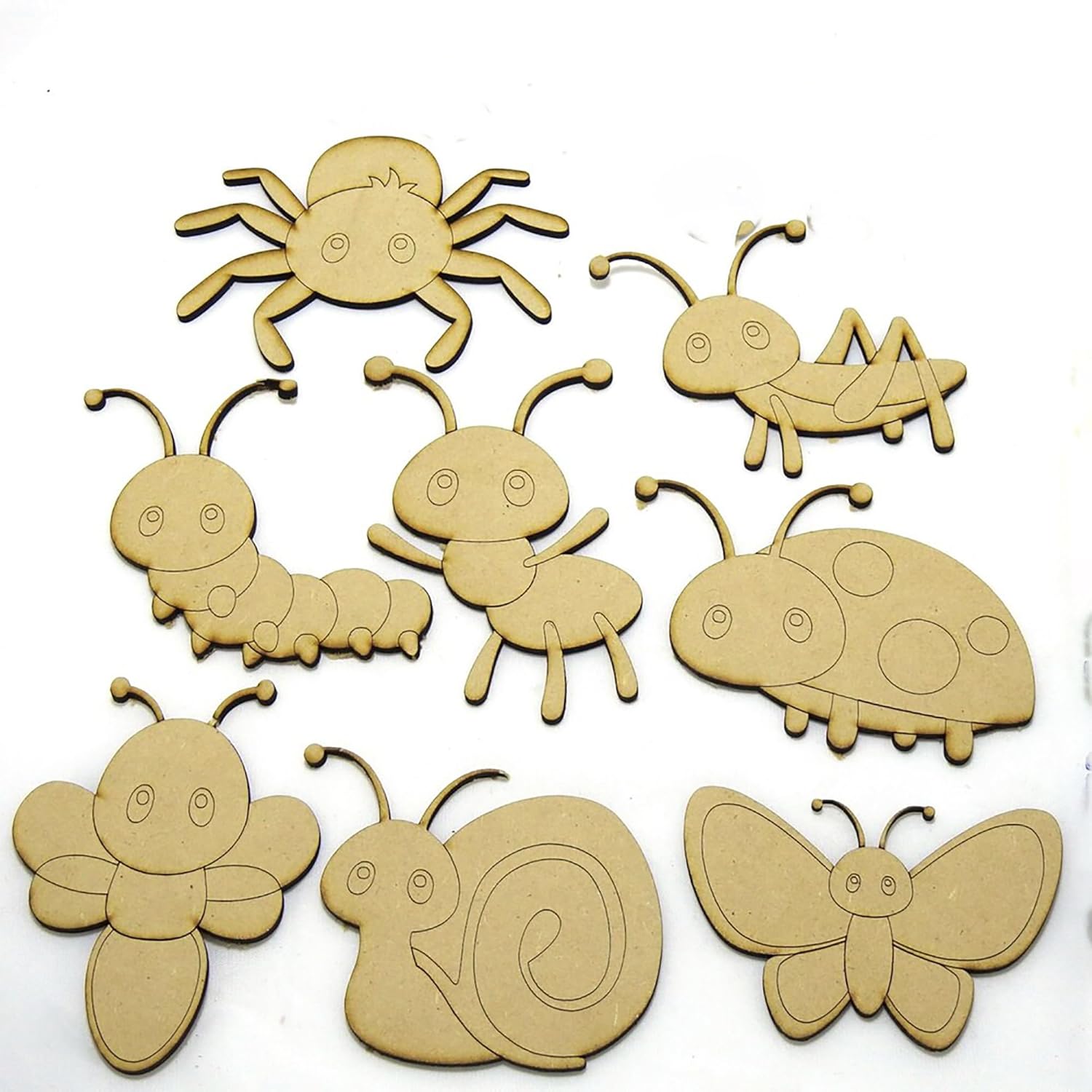 Set of wooden insect shapes on a white background
