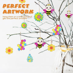 Colorful bee and flower decorations hanging on a tree branch with text 'Perfect Artwork'.