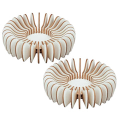 Two wooden coasters with a unique spiral design on a white background