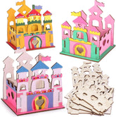 Colorful cardboard castle models with building pieces on a white background