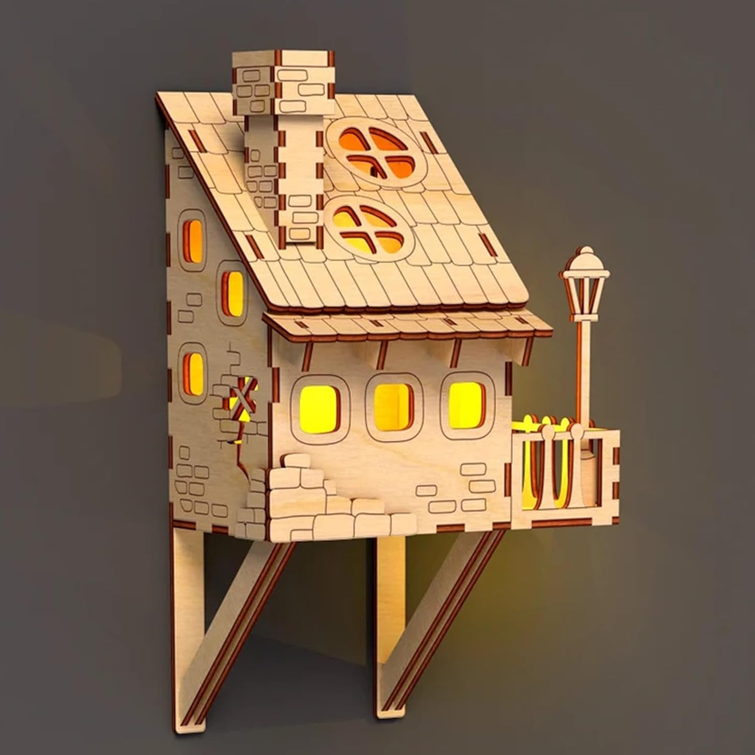 Wooden house-shaped lamp with a dark background
