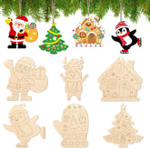 Set of wooden Christmas ornaments including Santa Claus, trees, gingerbread houses, and penguins on a white background with greenery at the top.