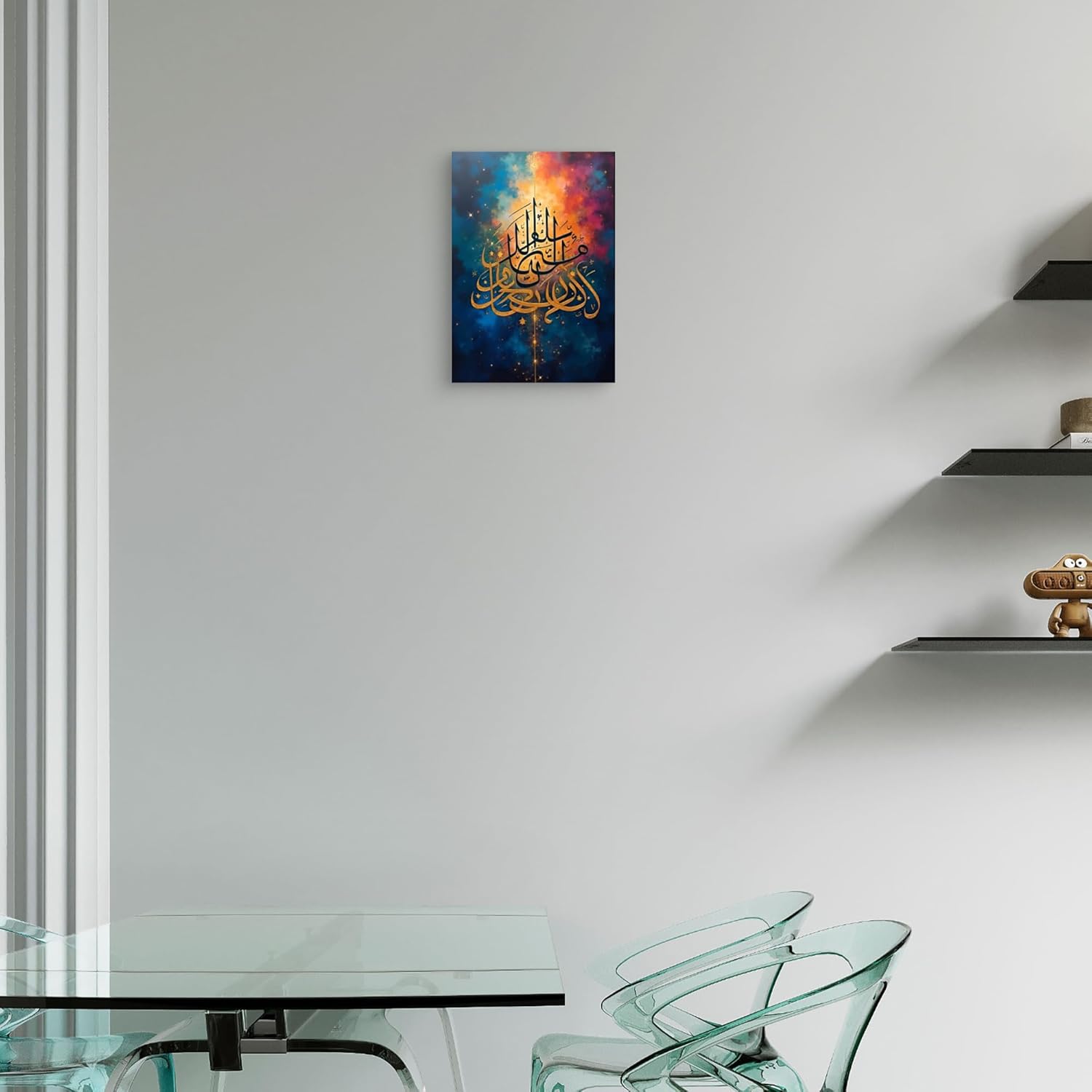 Colorful abstract painting with Arabic text on a white wall above a glass table.