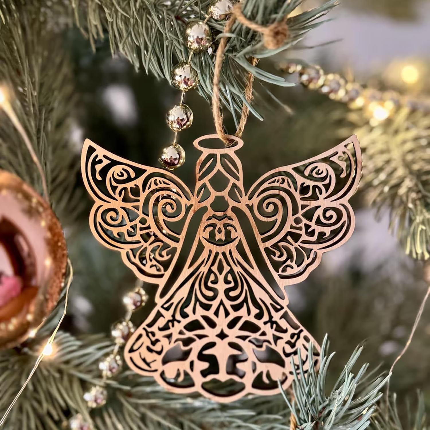 Decorative angel ornament on a Christmas tree