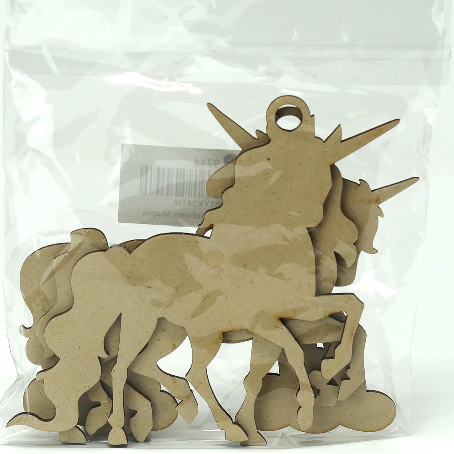 Unicorn-shaped wooden cutouts in a clear plastic bag