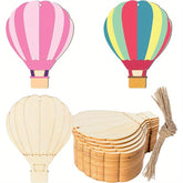 Colorful hot air balloon decorations with wooden bases and string on a white background