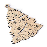 Set of wooden Christmas tree ornaments with cut-out designs on a white background