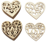 Four wooden heart-shaped decorations with intricate carvings on a white background