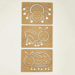 Three cardboard cutouts of animals on a beige background