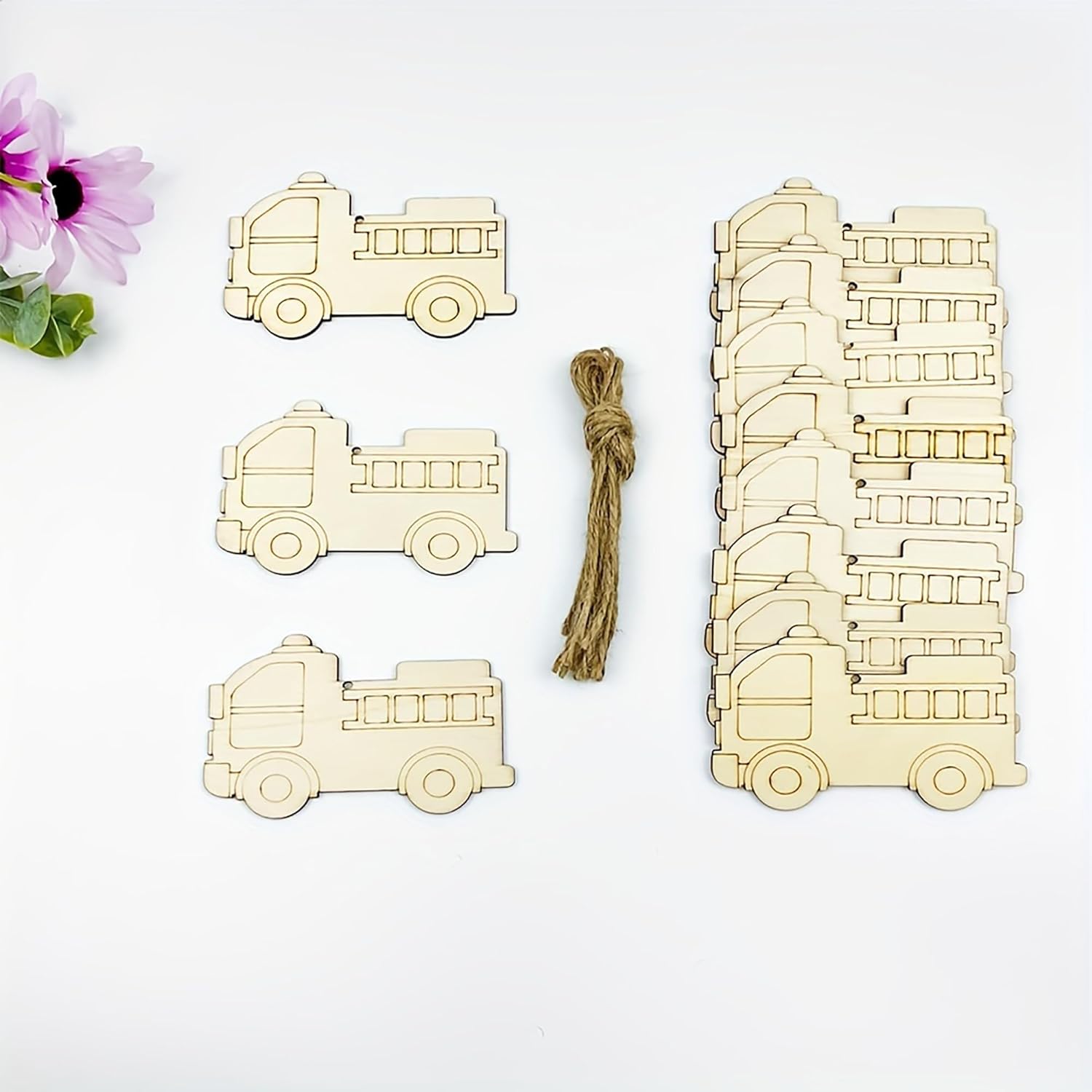 Wooden fire truck toys with a string on a white background