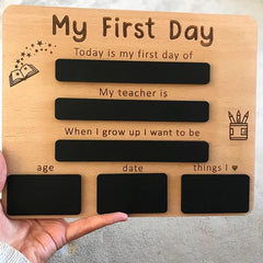 Wooden plaque with engraved text for 'My First Day' with black labels
