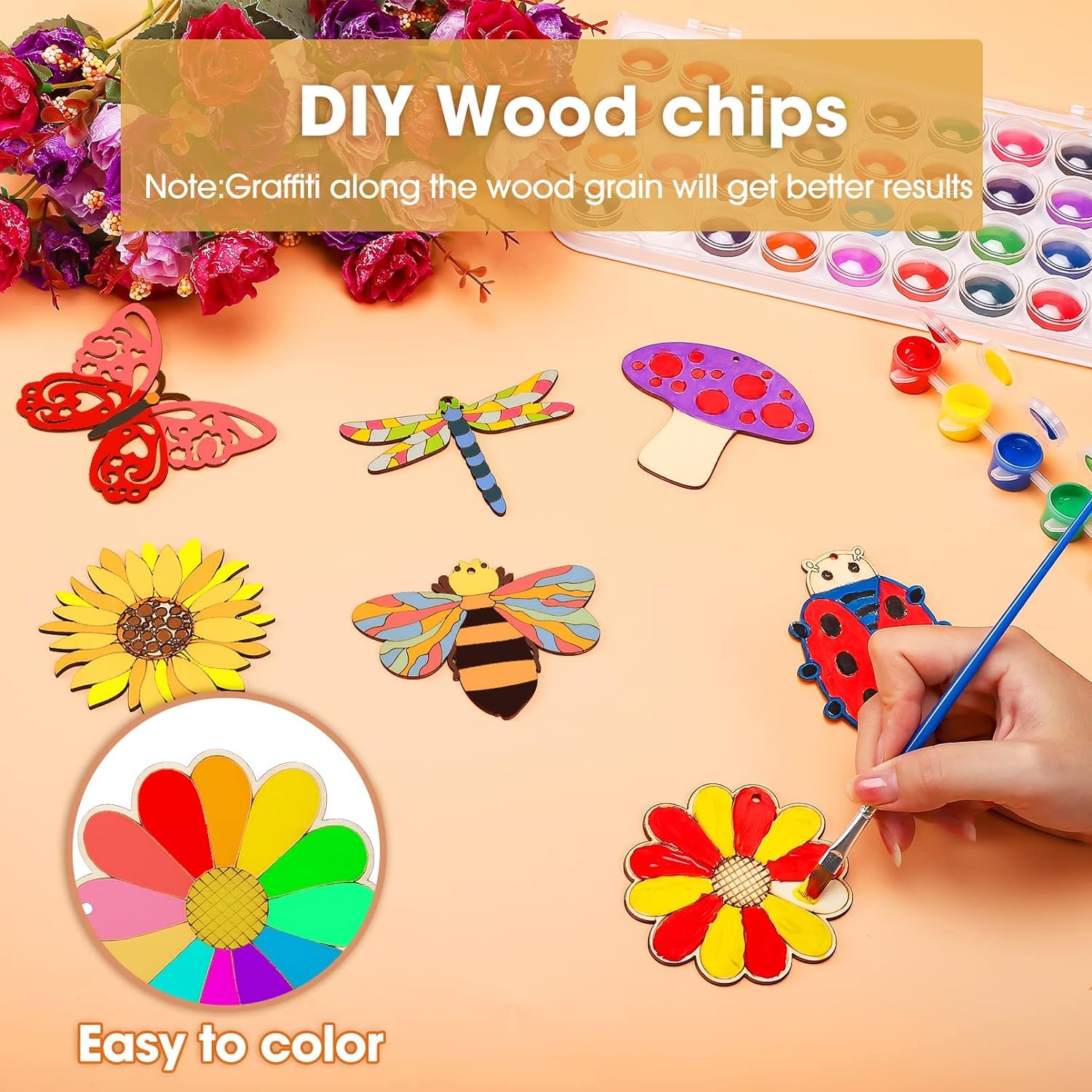 Colorful DIY wood chips with paint supplies on a table