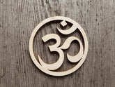 Wooden Om symbol on a wooden background