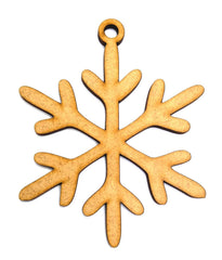 Wooden snowflake ornament on a white background