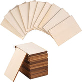 Stack of wooden panels with a fan arrangement above on a white background