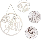 Decorative wooden cutout with 'She Said Yes!' text on a white background