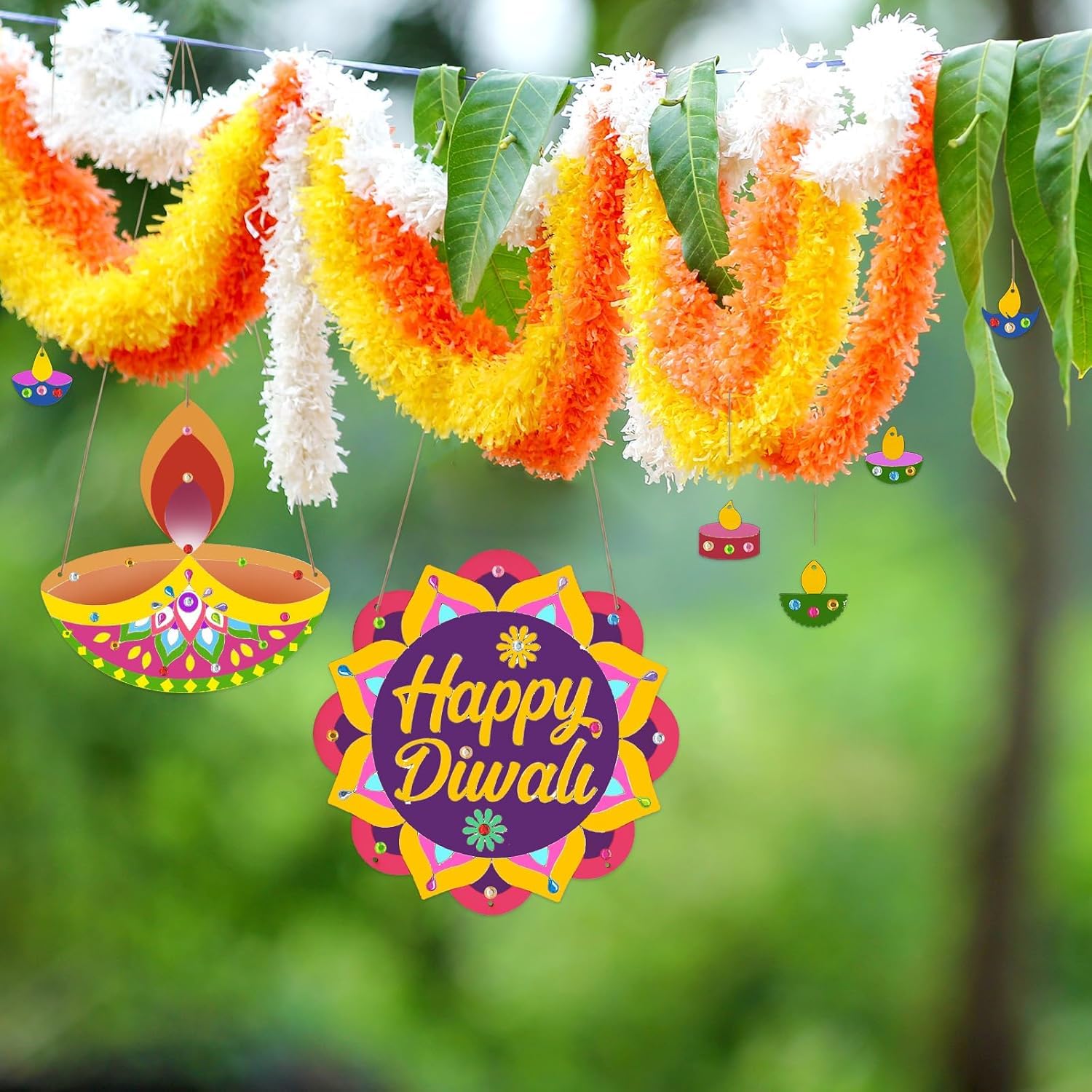 Decorative garlands with 'Happy Diwali' text against a green background
