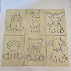 Six wooden cutouts of cartoon animals on a white background