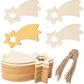 Wooden fairy wings and star shapes with twine on a white background