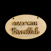 Oval-shaped wooden sign with 'Start with Bismillah' text on a black background