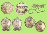 Bronze medallions with engraved designs and text on a green background