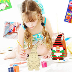 Child painting a wooden gnome with art supplies around